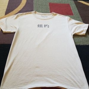 Chinese written shirt with tiger on back